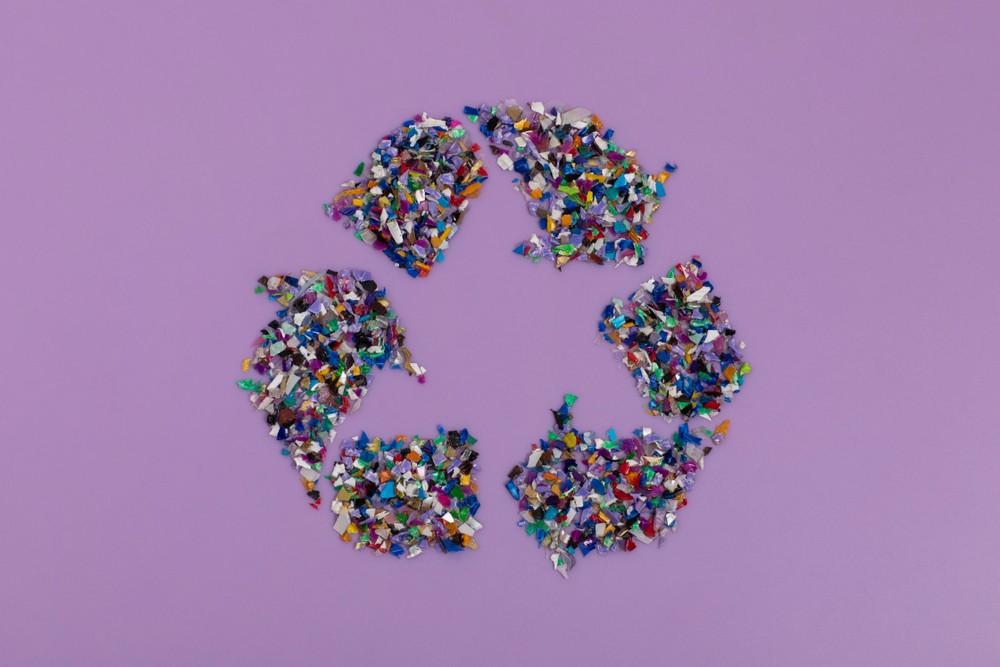 Empty plastic products in the shape of the recycling symbol 