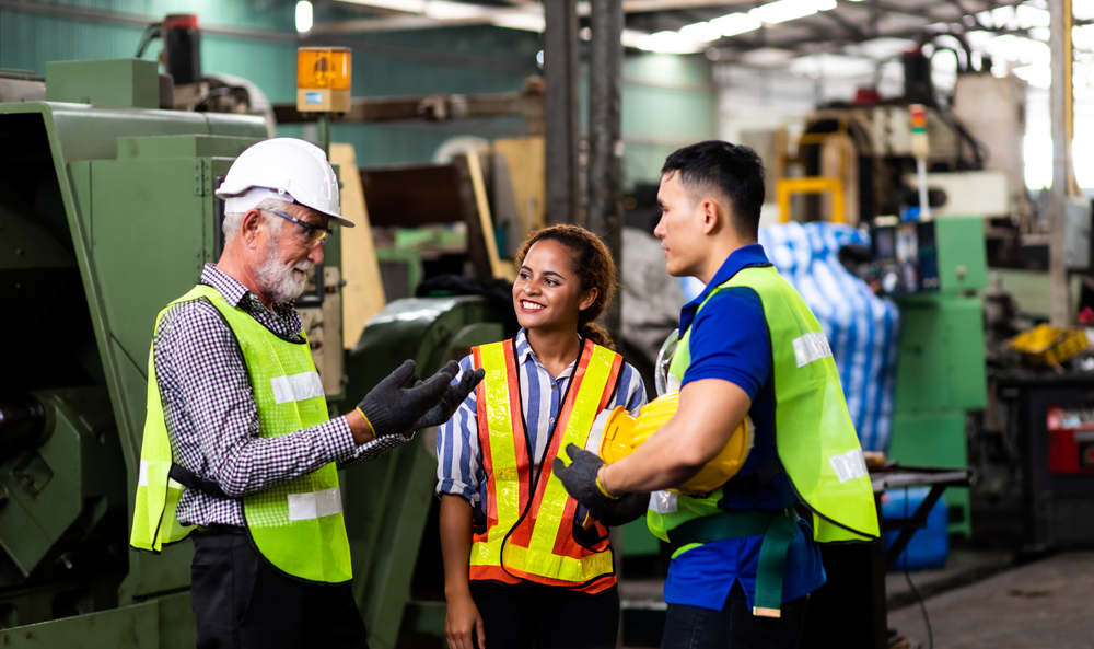 Man And Woman Engineering Wearing Safety Goggles And Hard Hats