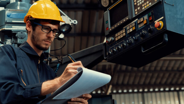 Factory Worker Working With Clipboard