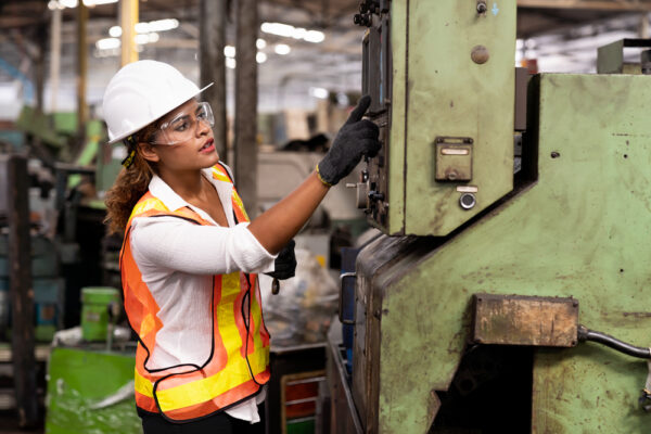 Worker At Work In The Industry Factory