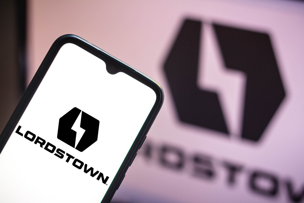 A phone displaying the "Lordstown" logo