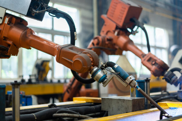 Robot Arm Working In Factory