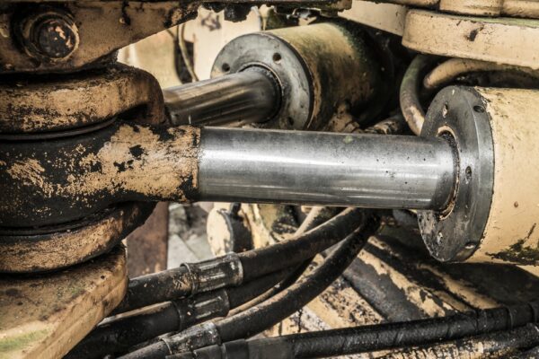 Hydraulic Cylinders On An Old Excavator Machine
