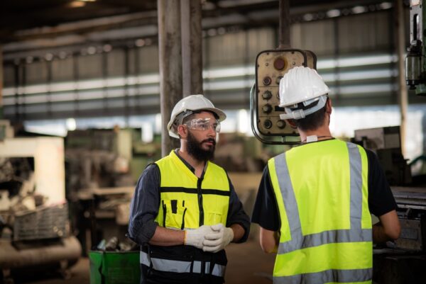 Electricians training in warehouse