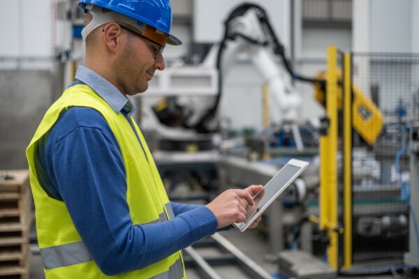 An Engineer Controlling a Machine