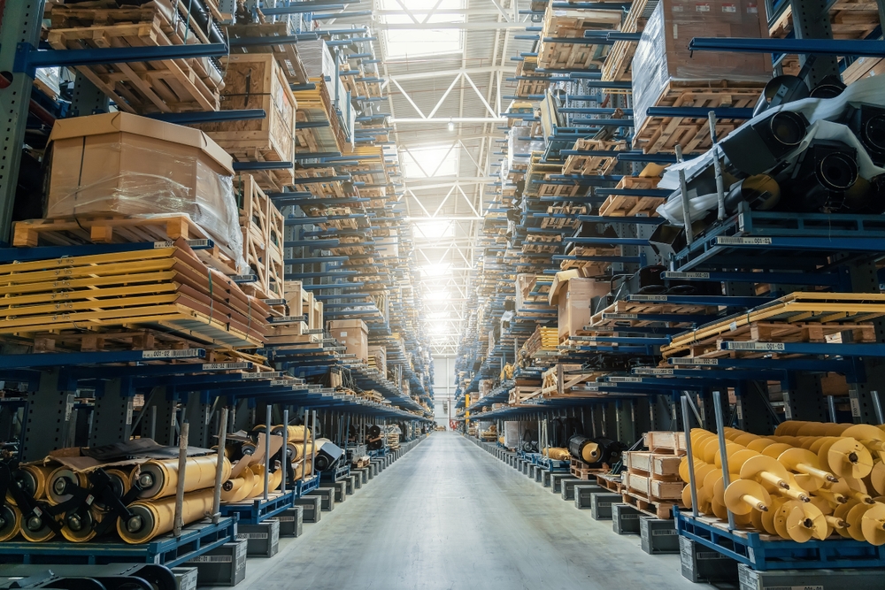 Modern Distribution Warehouse Interior With Many Goods In Boxes