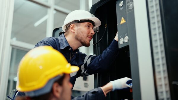 Two Production Engineers In Safety Wear