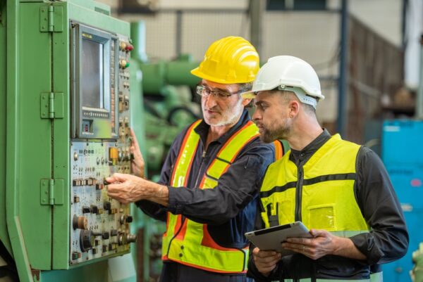 Two Professional Engineer Worker Technician Assistant In Helmet Inspection Check
