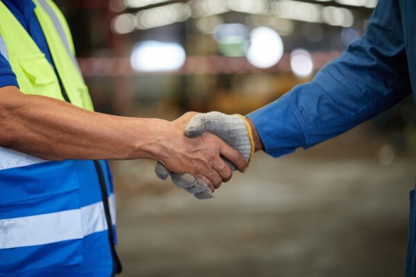 Closeup Worker Shaking Hands With Customer