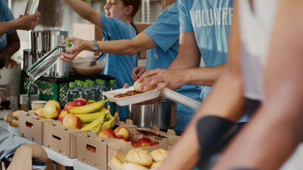 At Food Drive Poor Female Wheelchair User Receives Free Food