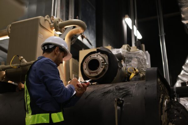 Maintenance Engineer Working on Industrial Motor