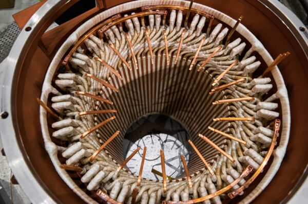 Electric Motor Stator In With Brass Part In Plant Workshop