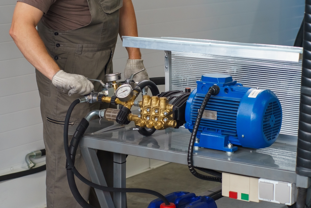 White Glove Turns On A Hydraulic Pump