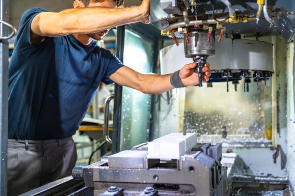 Man Working In Machining Center