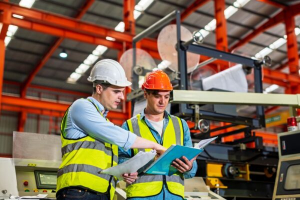 Engineer Working Team Service And Discussing Plan Of Maintenance Machine