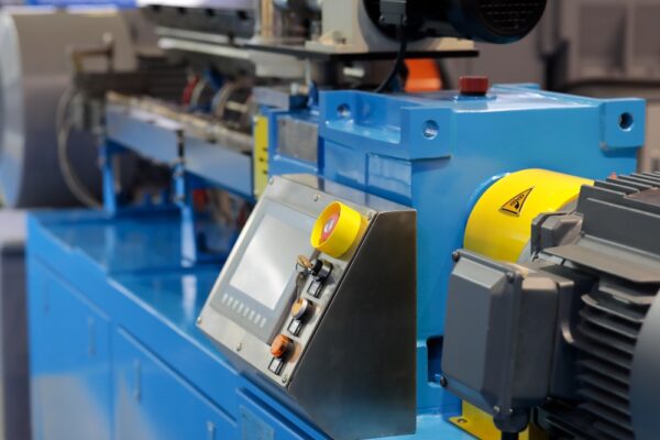Close Up Of Automated Plastic Extruder Machine