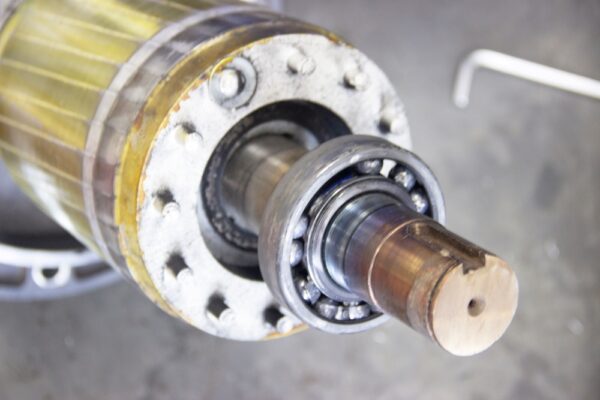 Electric Motor Shaft With Worn Ball Bearing