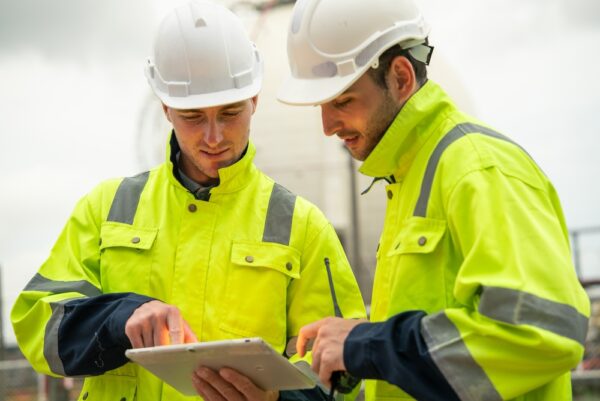 Engineer Worker Watching Work Monitor On Digital Tablet