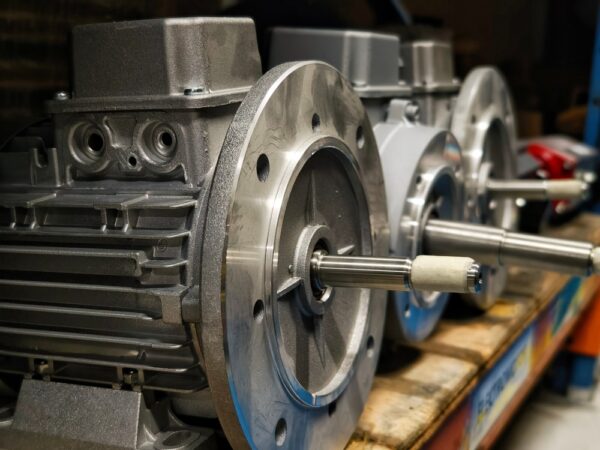 Close-up Of Three Electric Motors With Metal Shaft