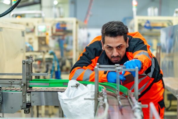Male Technician Mechanical Engineer Maintenance And Repairing Automated Conveyor Belt