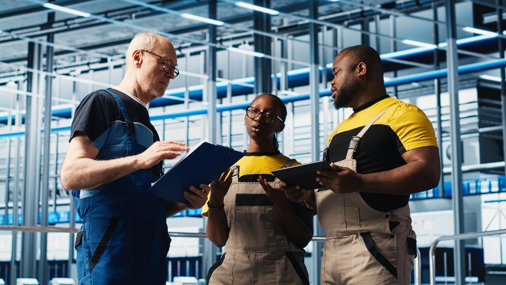 Photovoltaics Smart Factory Team Leader And Workers Analyzing Data