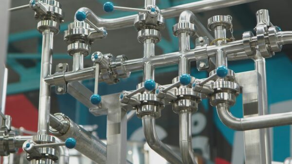 Stainless Steel Piping System Displaying An Intricate Network Of Pipes