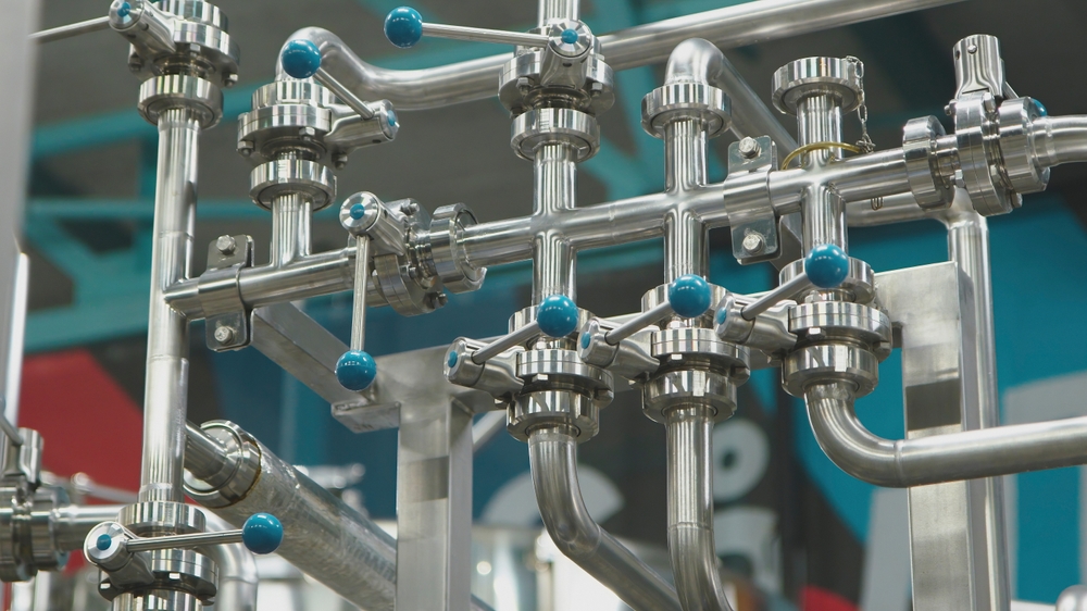Stainless Steel Piping System Displaying An Intricate Network Of Pipes