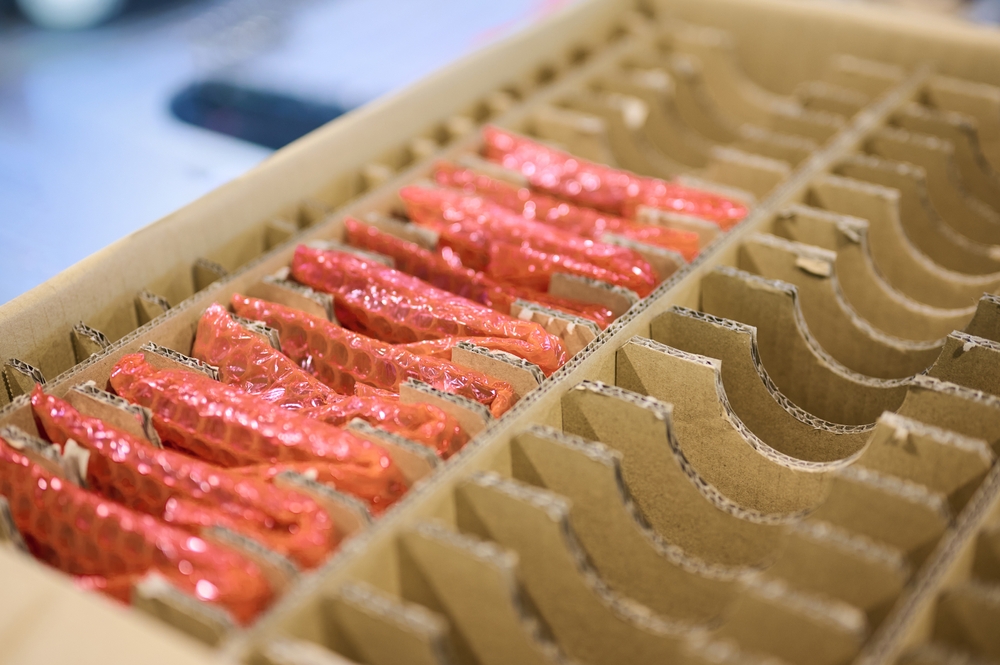 Electronic Boards Neatly Organized In A Cardboard Box Ready For Shipping