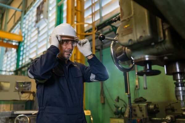 Professional Technician Checking Industrial Drill