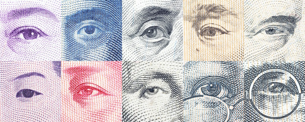 Eyes from faces on money bills from different currencies